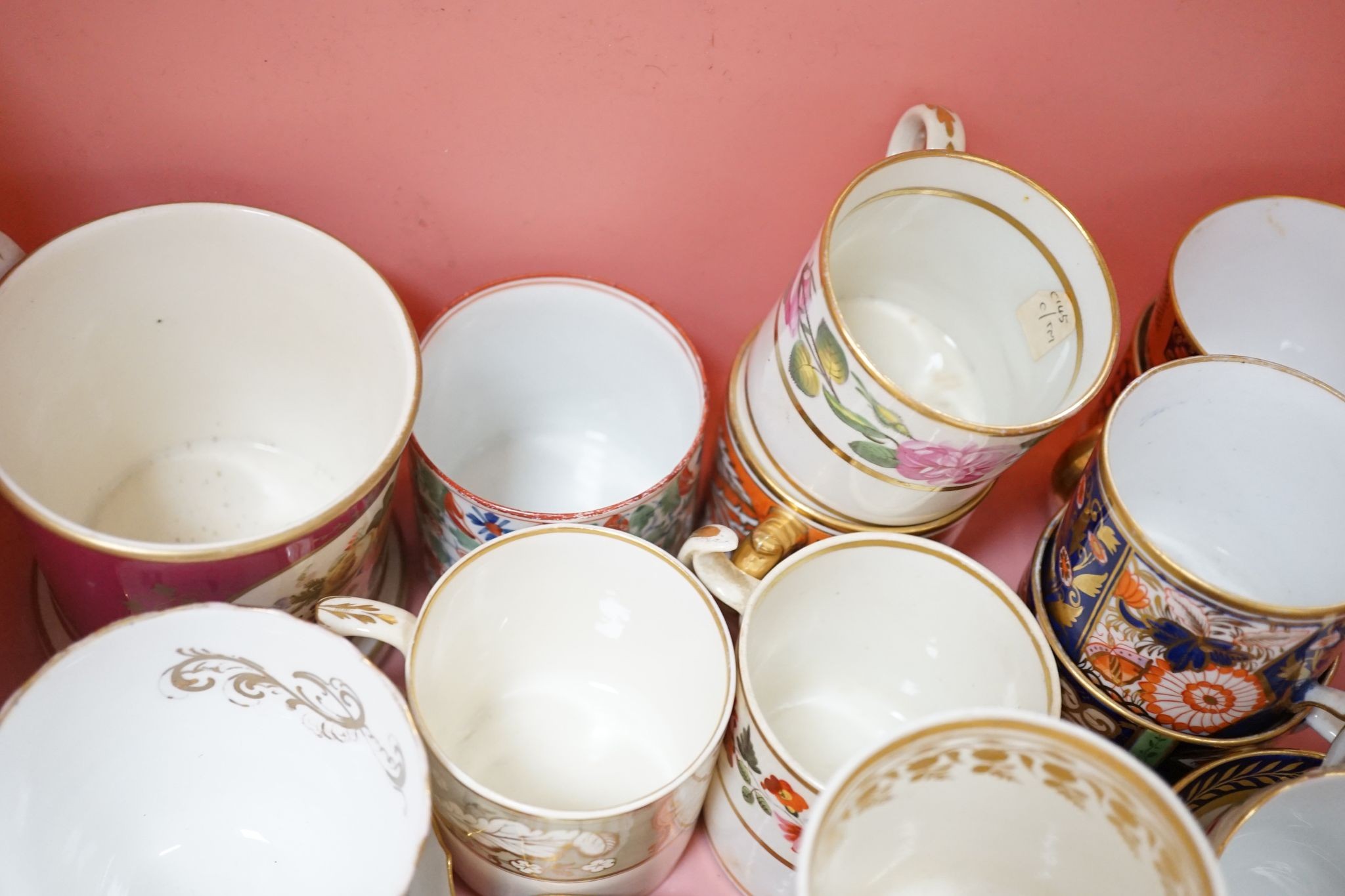 A collection of 19th century English porcelain tea and coffee cups, saucers and other tableware including Royal Crown Derby etc.